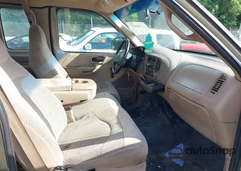 1999 Ford F150 from USA, damaged, VIN 1FTRX18W9XNB33354